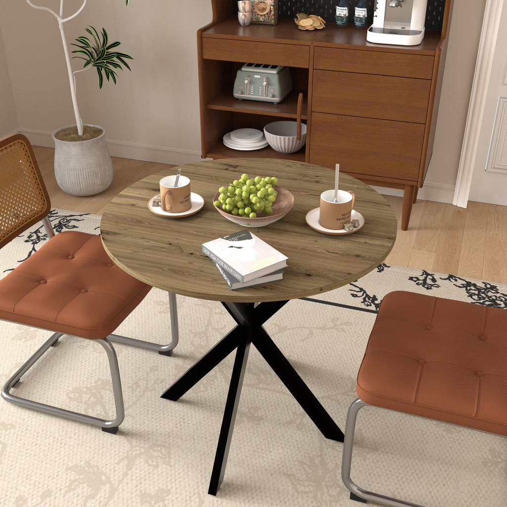 Round wood dining table with black metal base