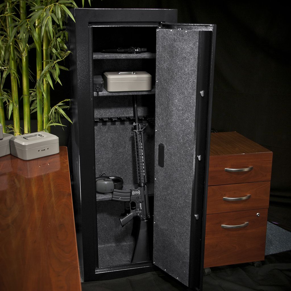 Large gun safe interior with rifle handgun and lockbox