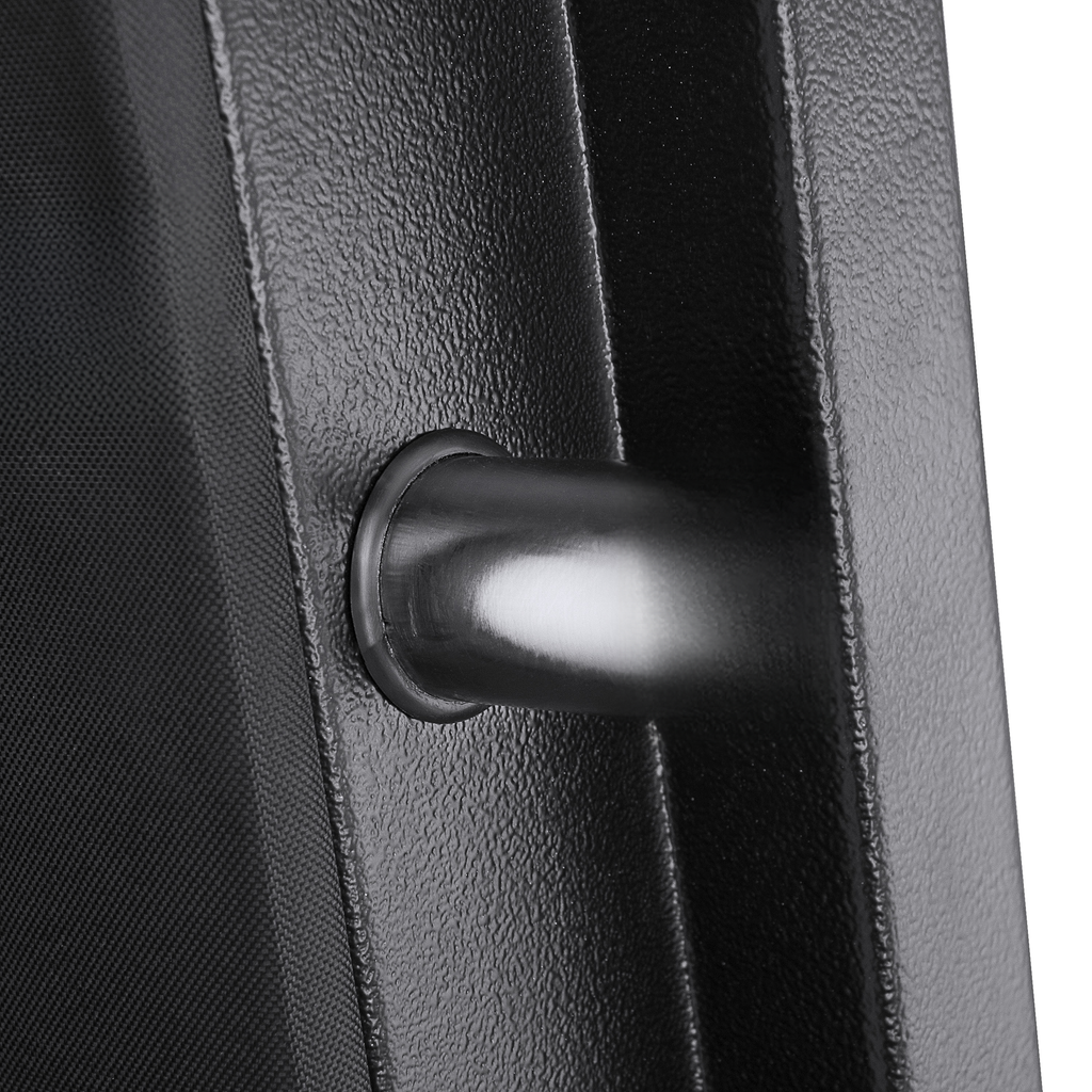 Closeup of a textured black metal suitcase handle