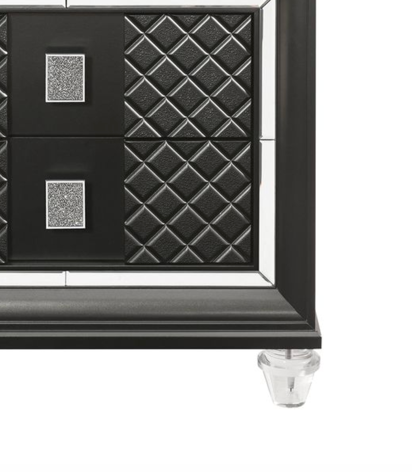 Black quilted dresser drawer fronts with mirrored accents and crystal knobs