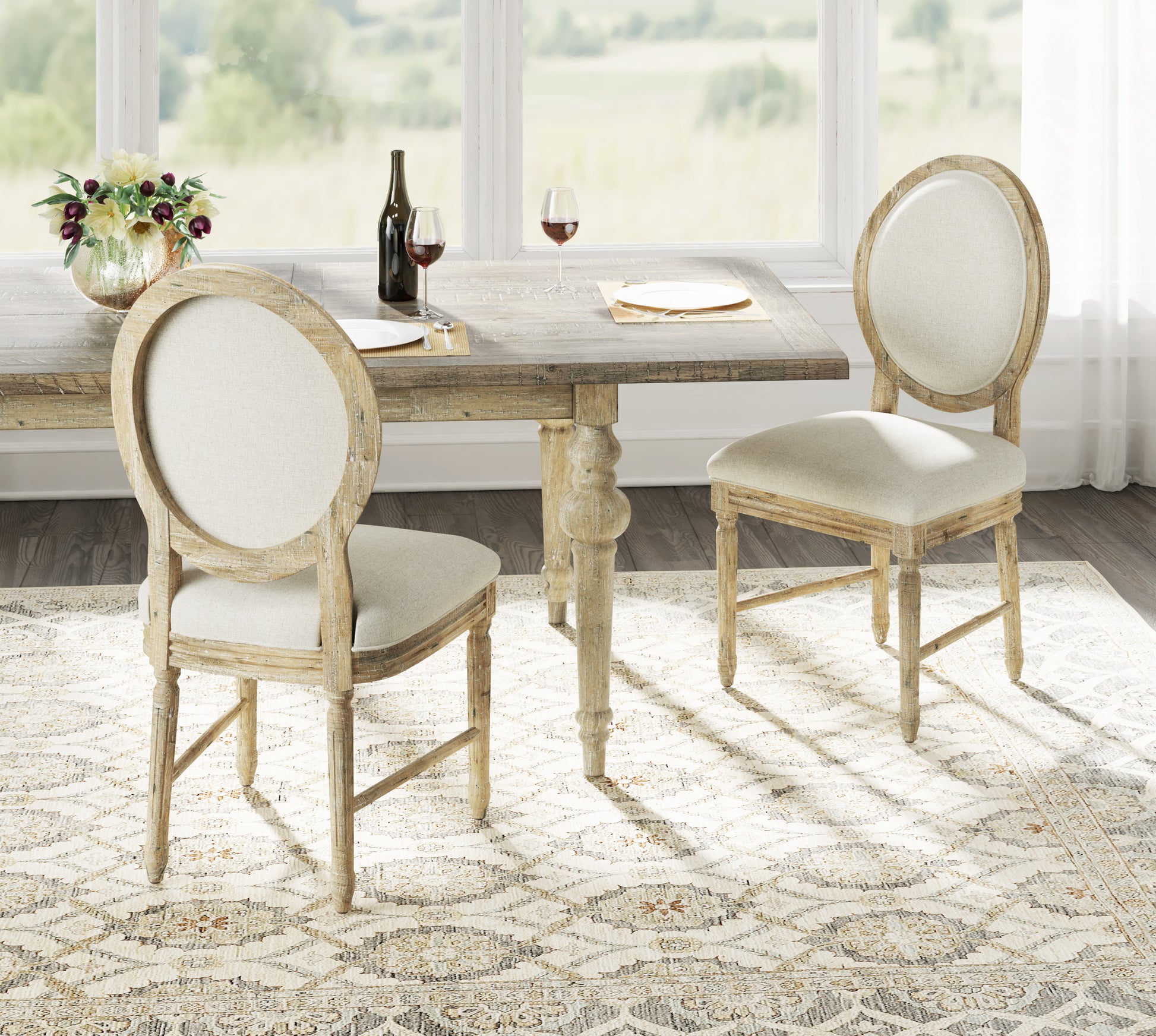Rustic farmhouse dining chairs with distressed wood frames and cream upholstery