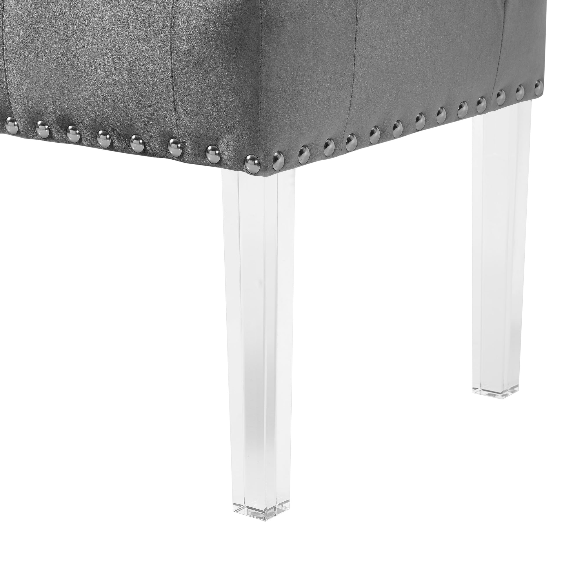 Gray velvet ottoman with silver nailhead trim and clear acrylic legs