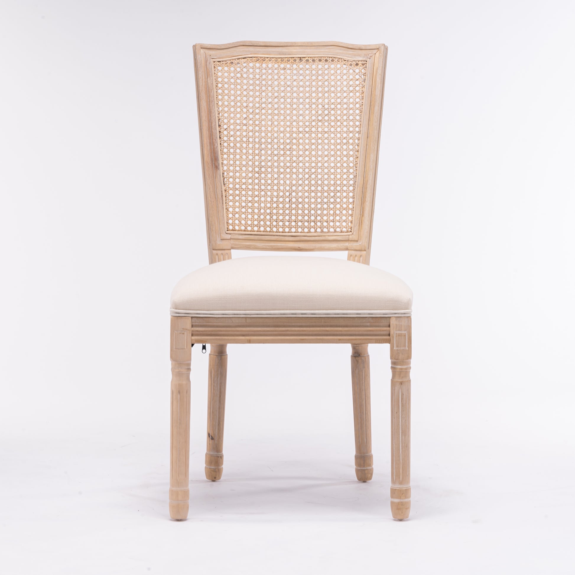 Light wood cane back dining chair with upholstered seat
