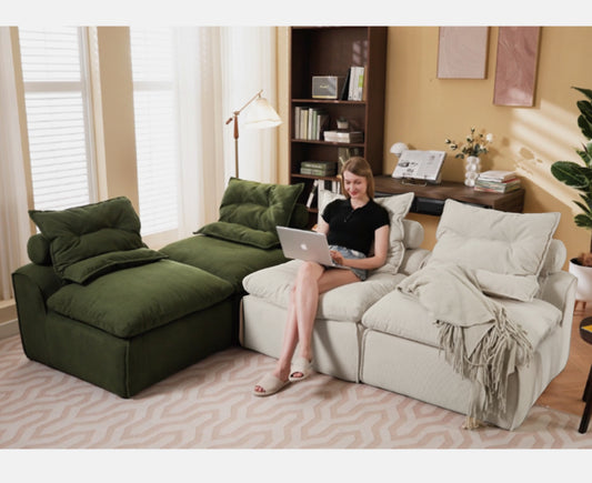 Deep green modular sectional sofa with plush cushions perfect for modern living rooms