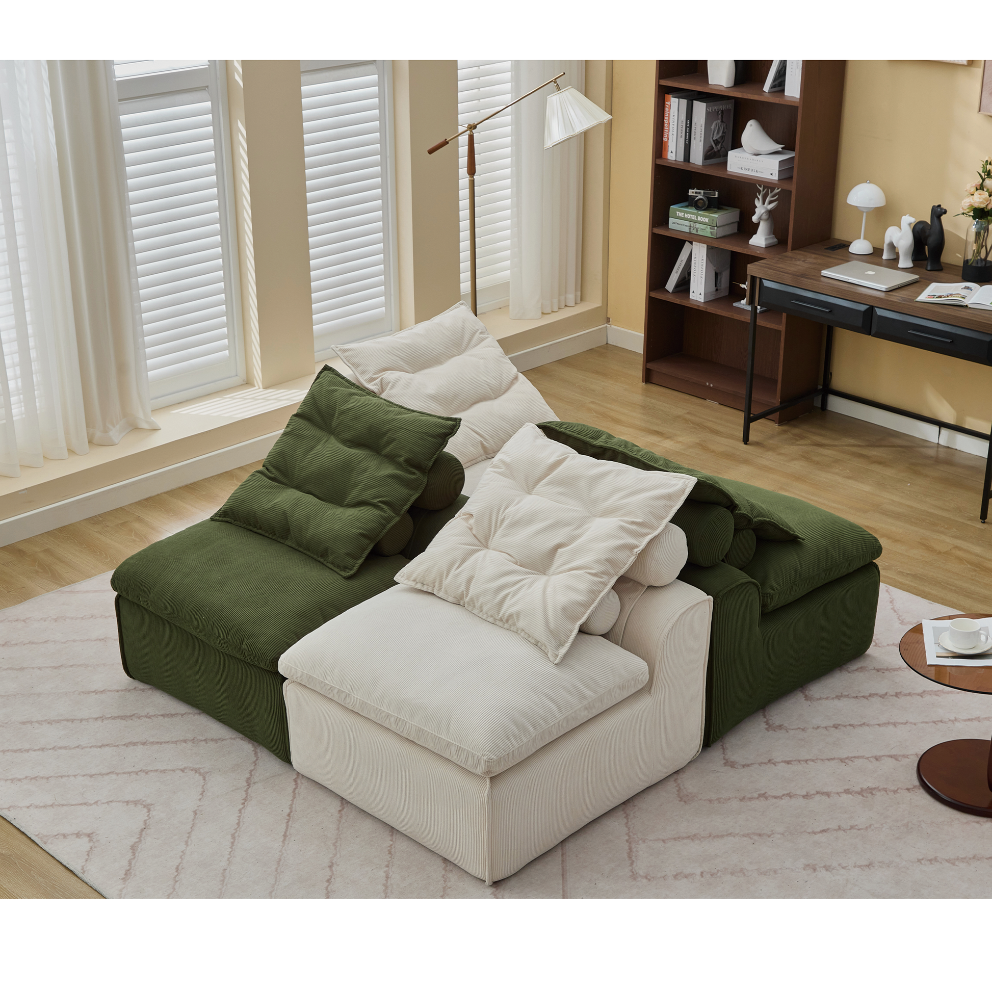 Modular corduroy sectional sofa with green and cream cushions