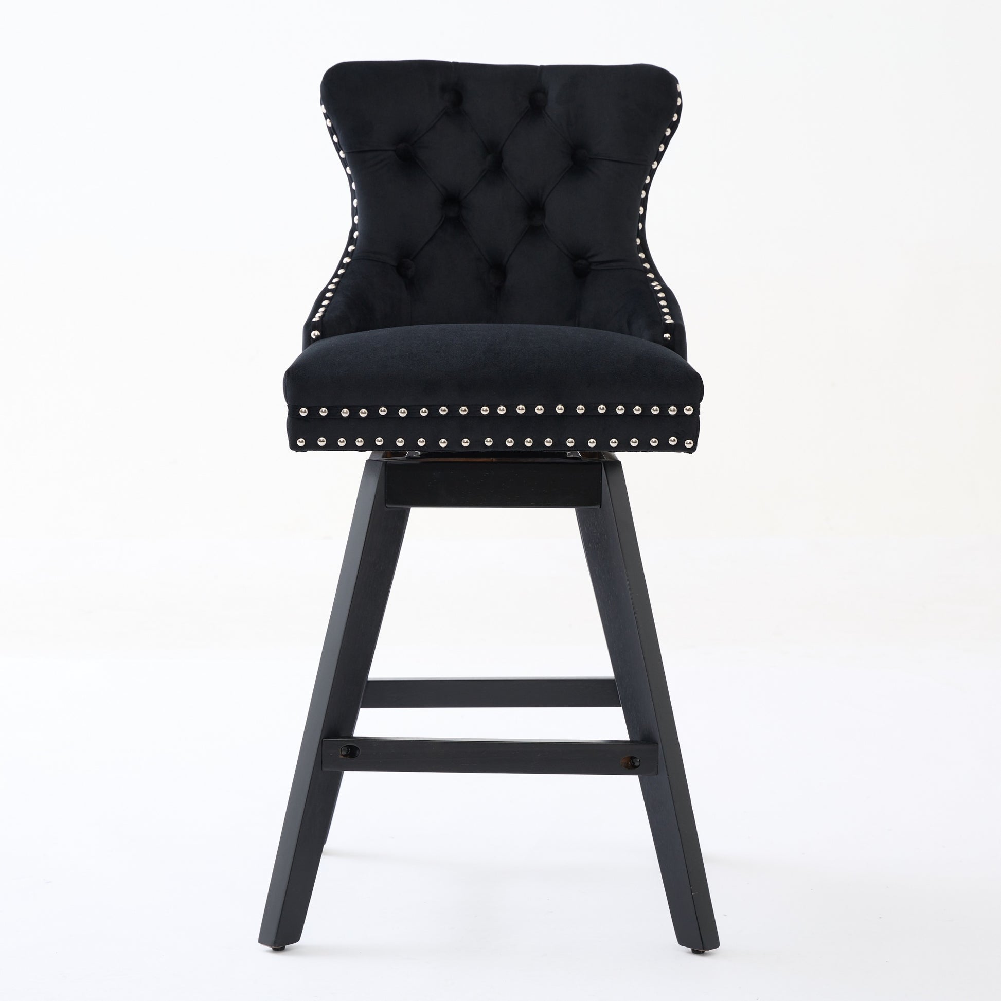 Black velvet tufted swivel bar stool with silver nailhead trim