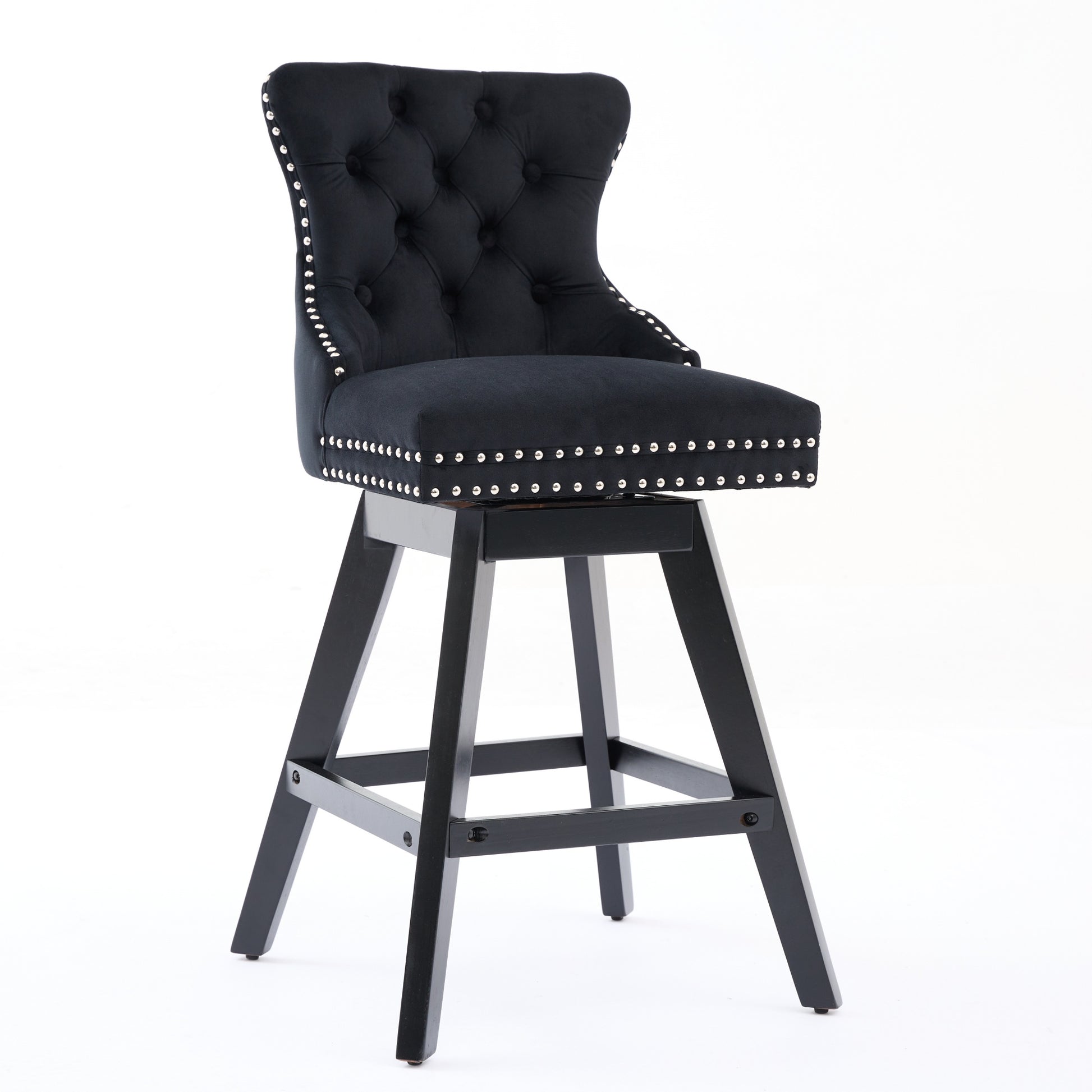 Black velvet swivel bar stool with tufted back and silver nailhead trim