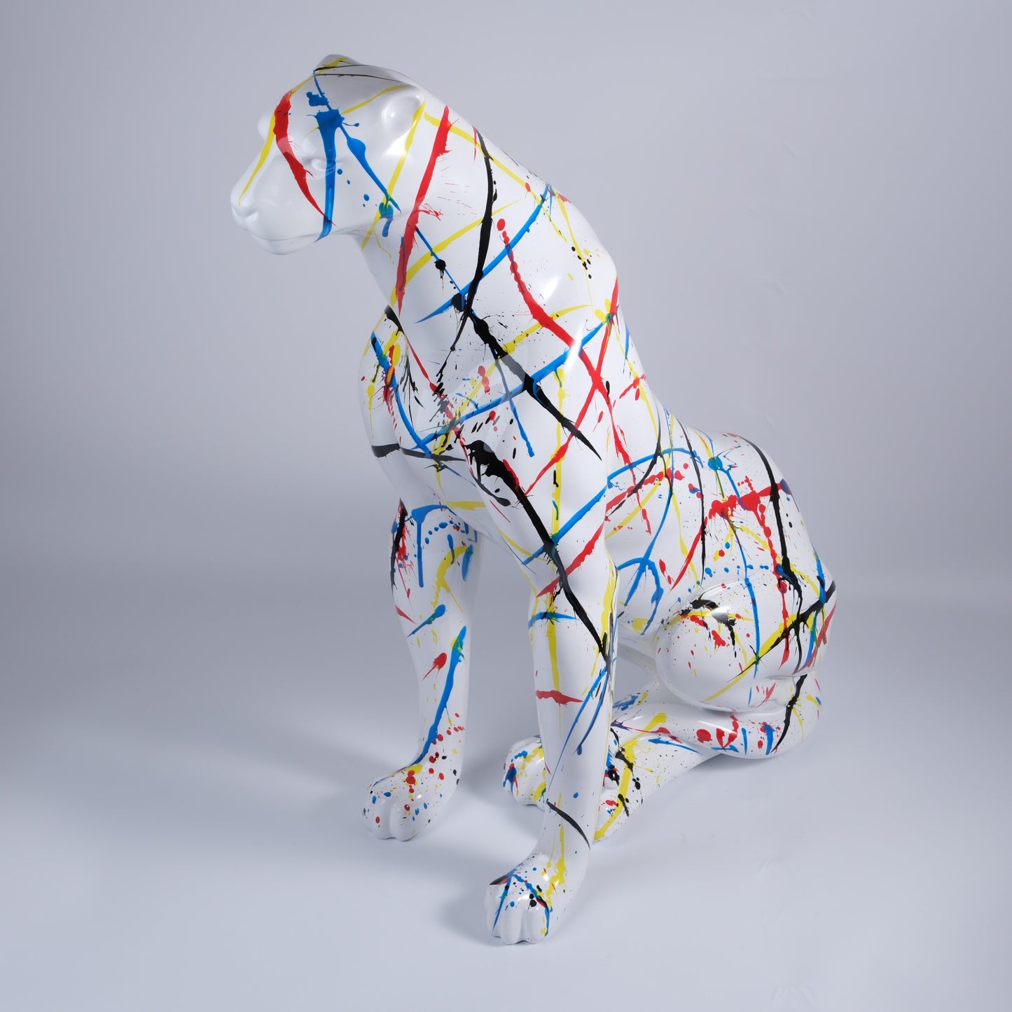 Abstract art panther sculpture with paint splatter