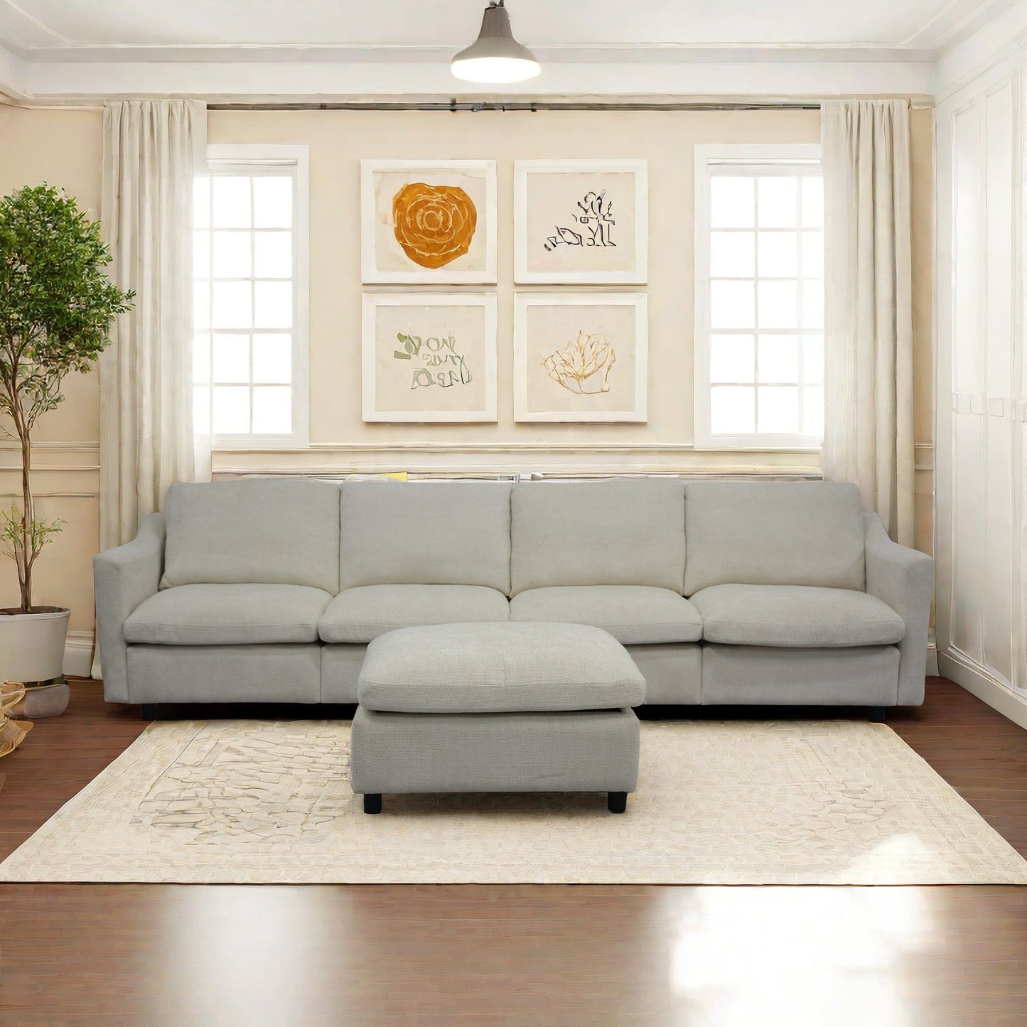 Light gray fabric sectional sofa with ottoman in a modern living room