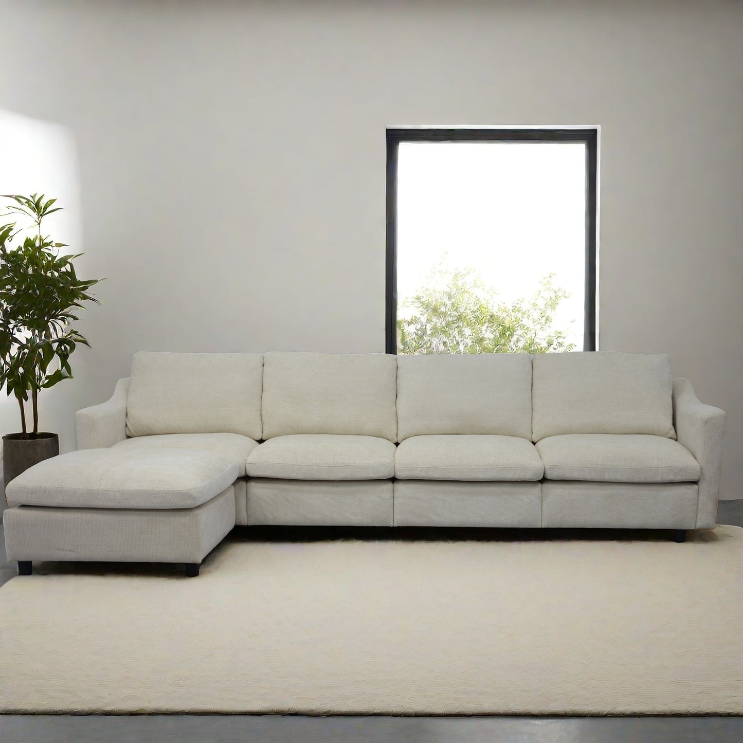 A modern cream sectional sofa with deep seating and plush cushions perfect for a living room