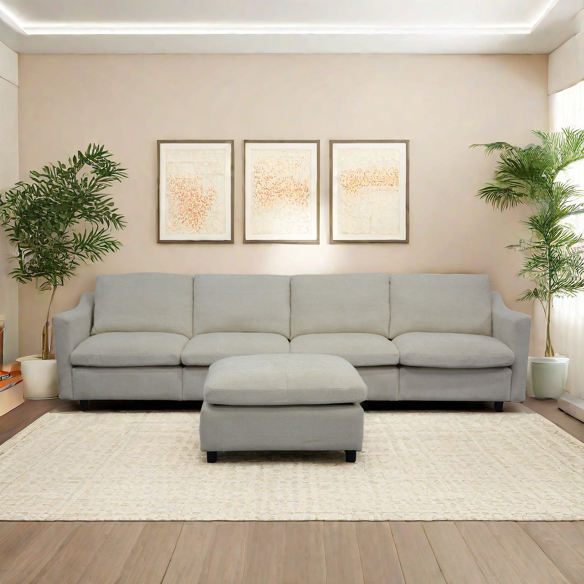 Light gray sectional sofa with matching ottoman