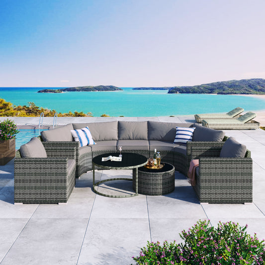 Gray wicker sectional outdoor patio furniture with plush cushions and coffee tables