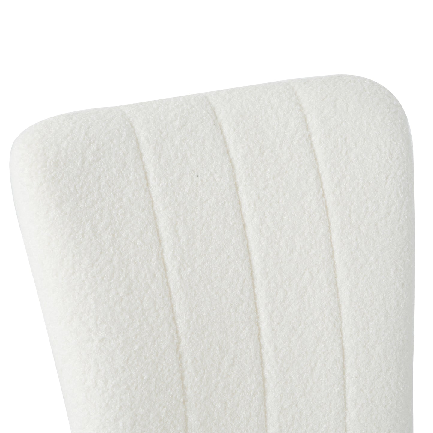 Cream boucle upholstered chair back with vertical stitching detail