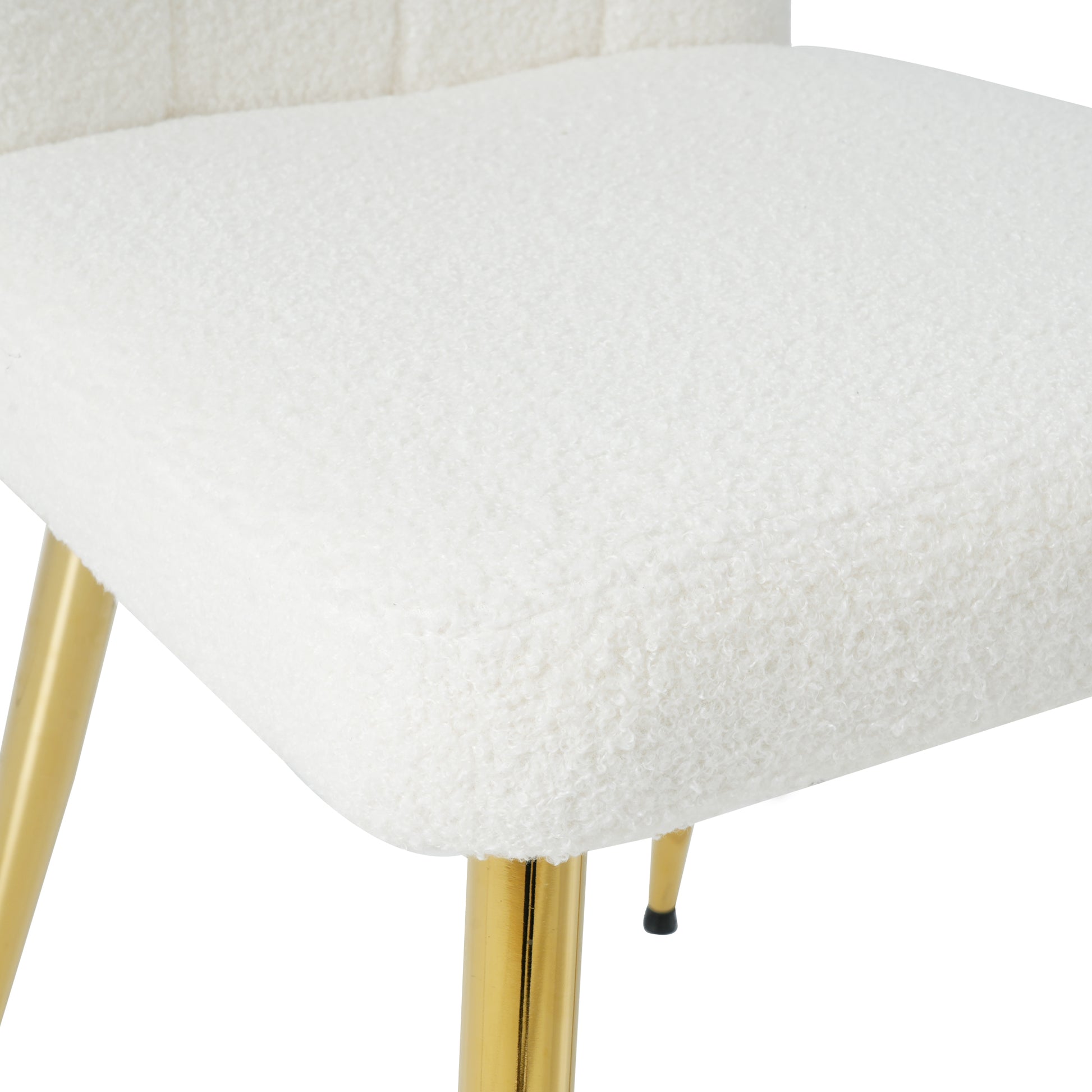 Cream boucle upholstered dining chair with gold legs