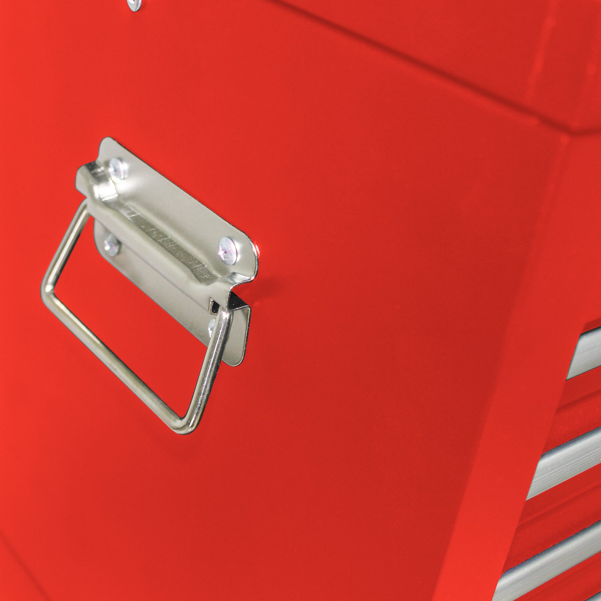 Red metal toolbox with silver handle