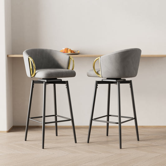 Grey velvet swivel bar stool with gold handle accents