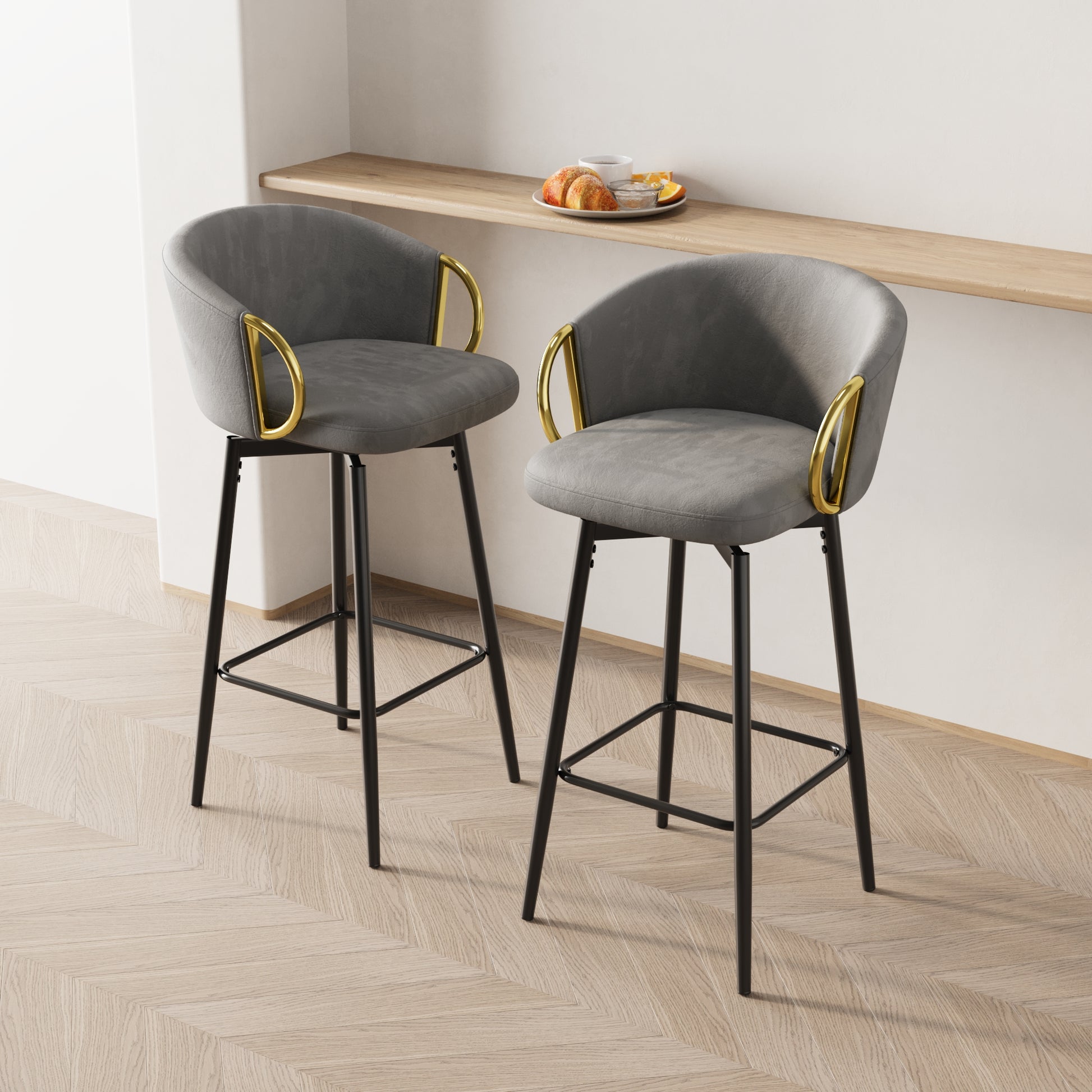 Grey swivel bar stool with gold accents and black metal legs