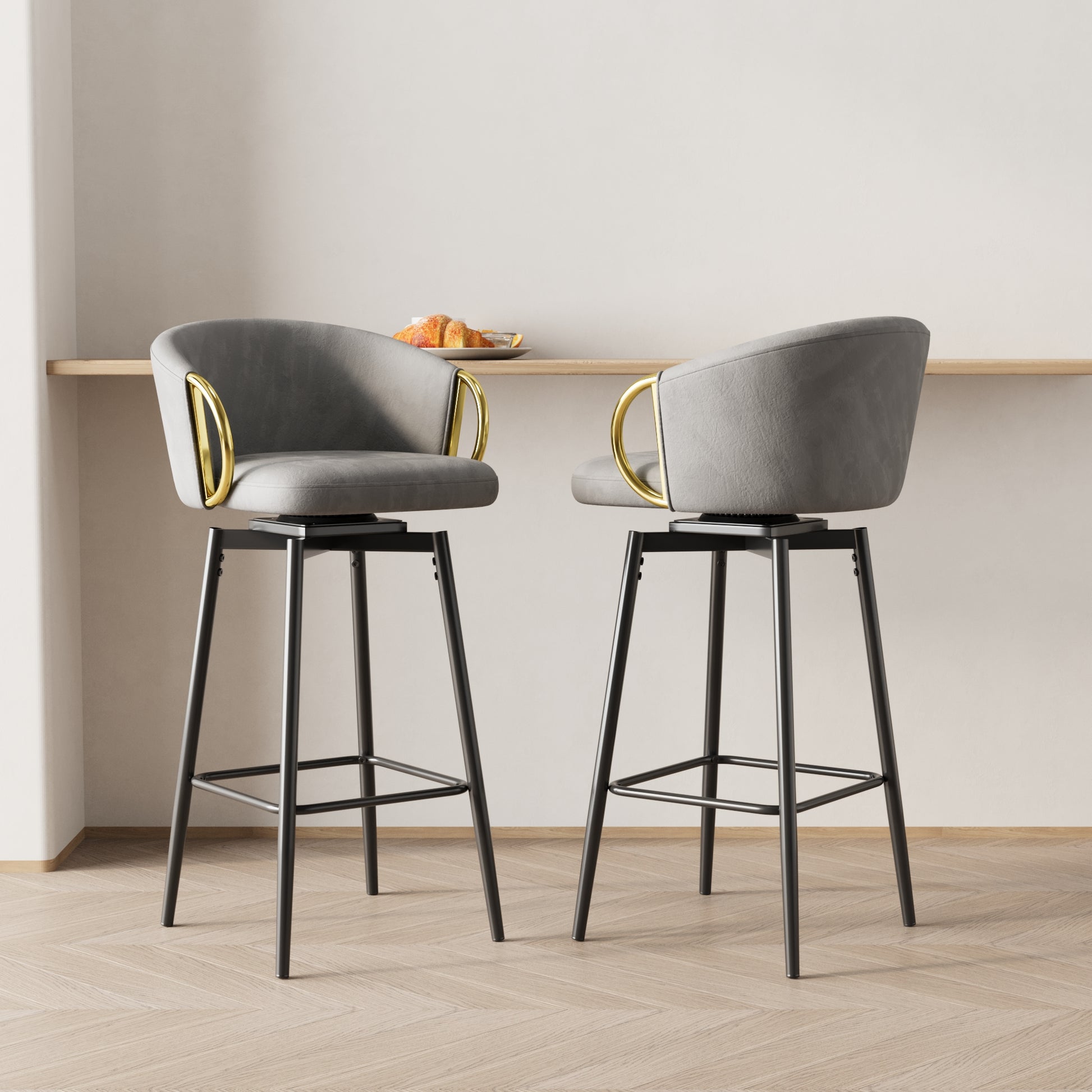 Grey velvet swivel bar stool with gold accents