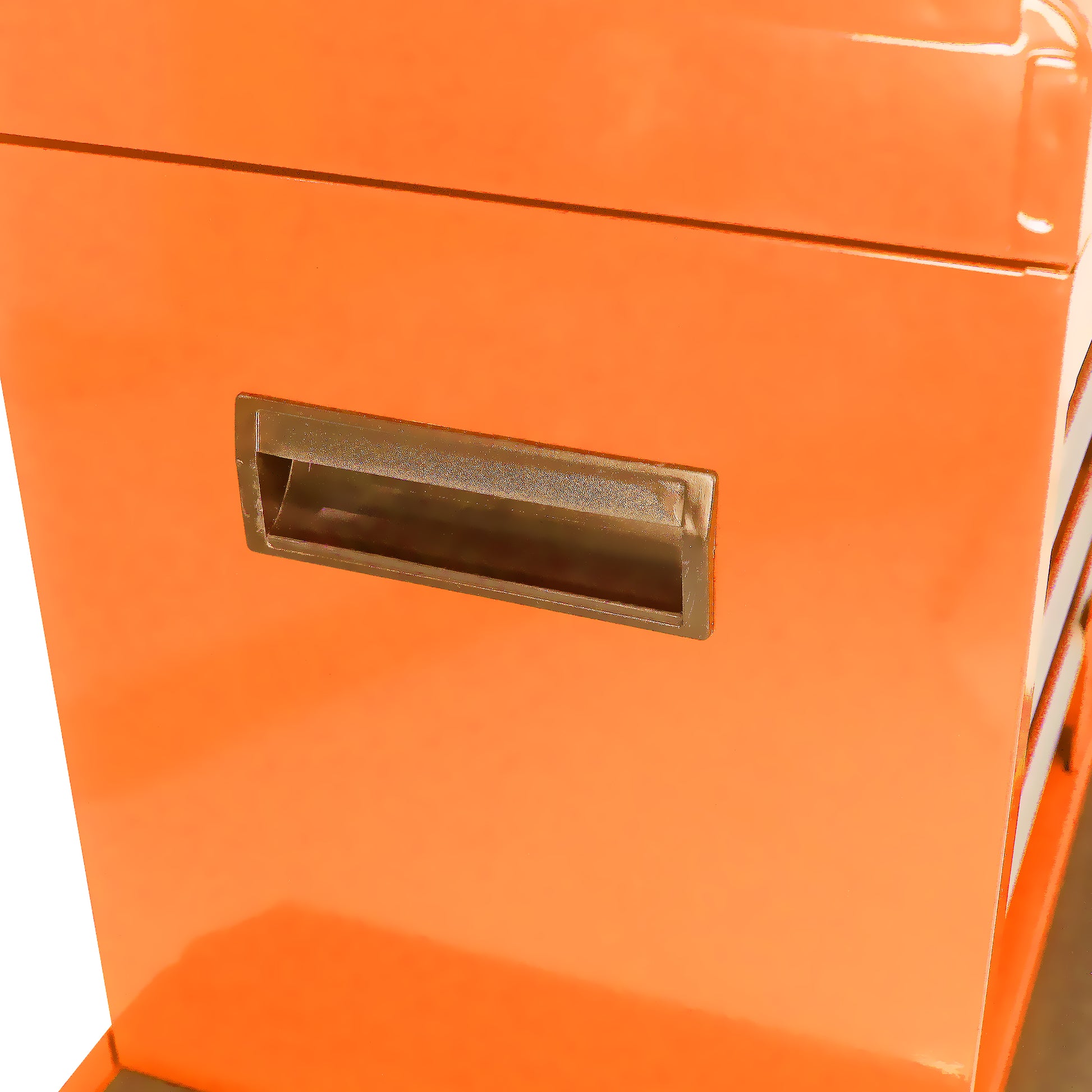 Orange metal filing cabinet with recessed drawer pull
