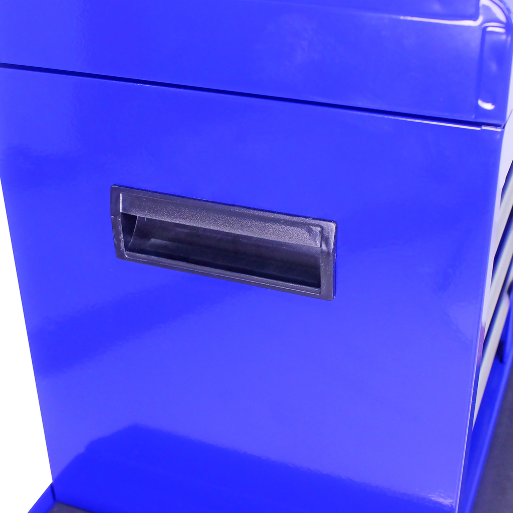 Closeup of a blue metal tool chest side with a black handle recess