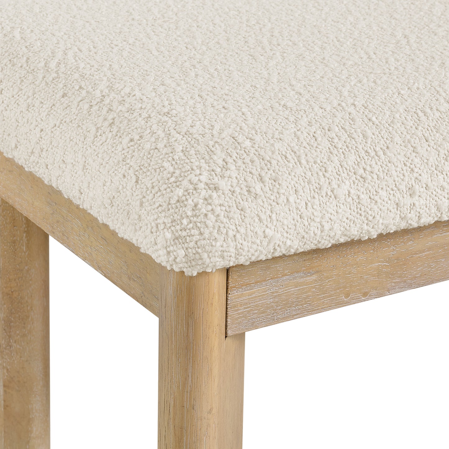 Closeup of boucle fabric stool seat in ivory
