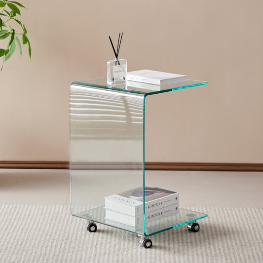Curved clear glass side table with chrome wheels