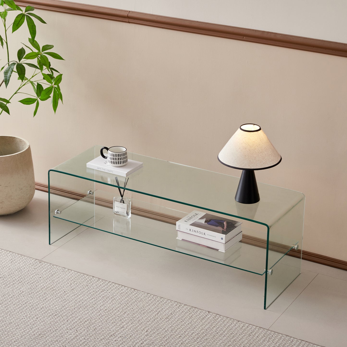 Modern clear glass coffee table with two shelves