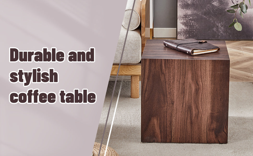 Modern walnut cube coffee table with leatherbound notebook