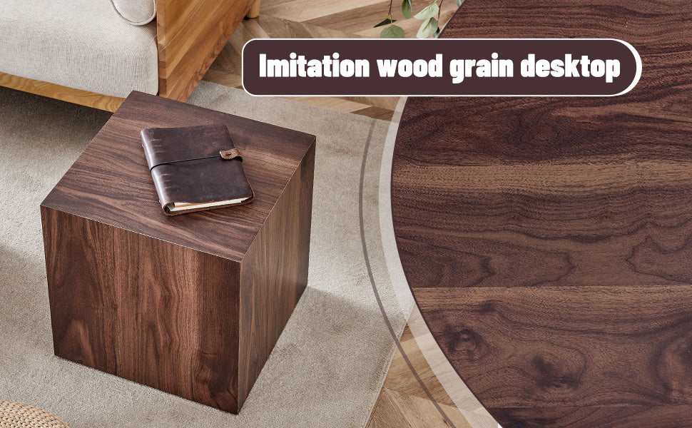 Dark brown faux wood cube side table with a leatherbound notebook
