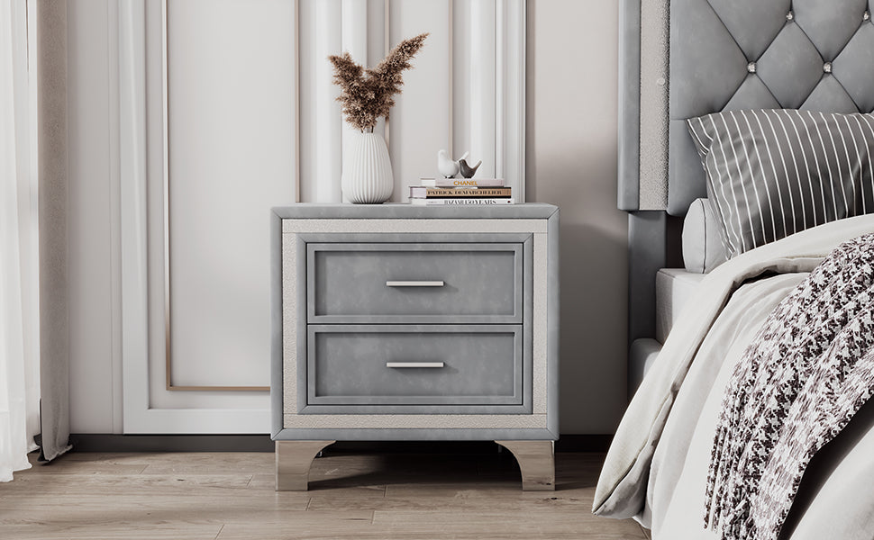 Gray velvet nightstand with two drawers and mirrored trim