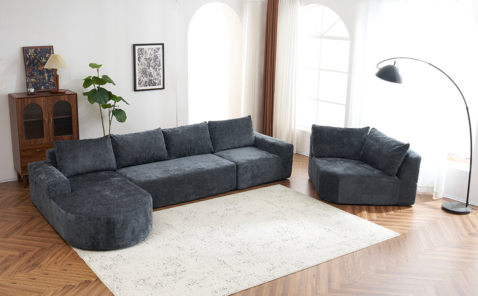 Dark grey modular sectional sofa with plush velvet upholstery