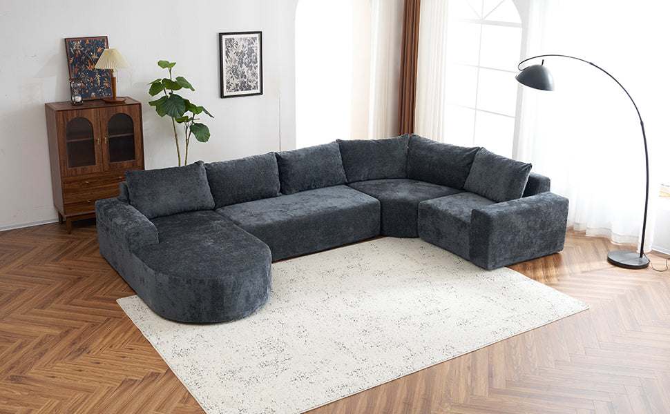 Dark gray sectional sofa with plush fabric