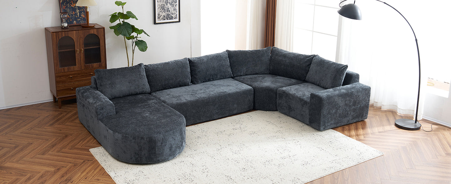 Dark grey sectional sofa with plush cushions