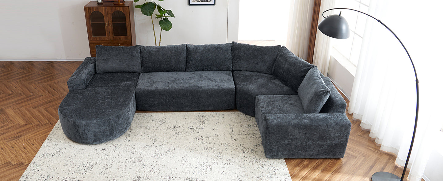 Dark grey sectional sofa with plush fabric