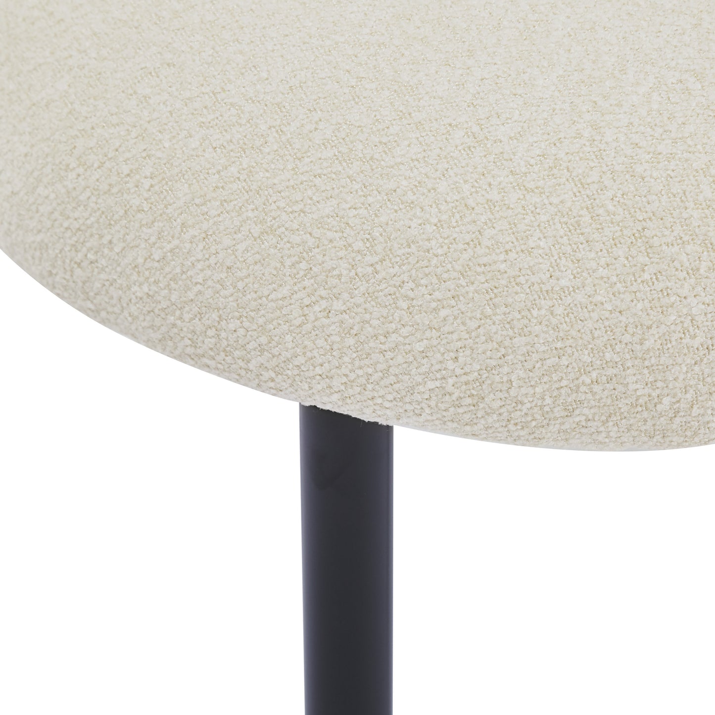 Cream boucle fabric stool seat detail with black metal leg