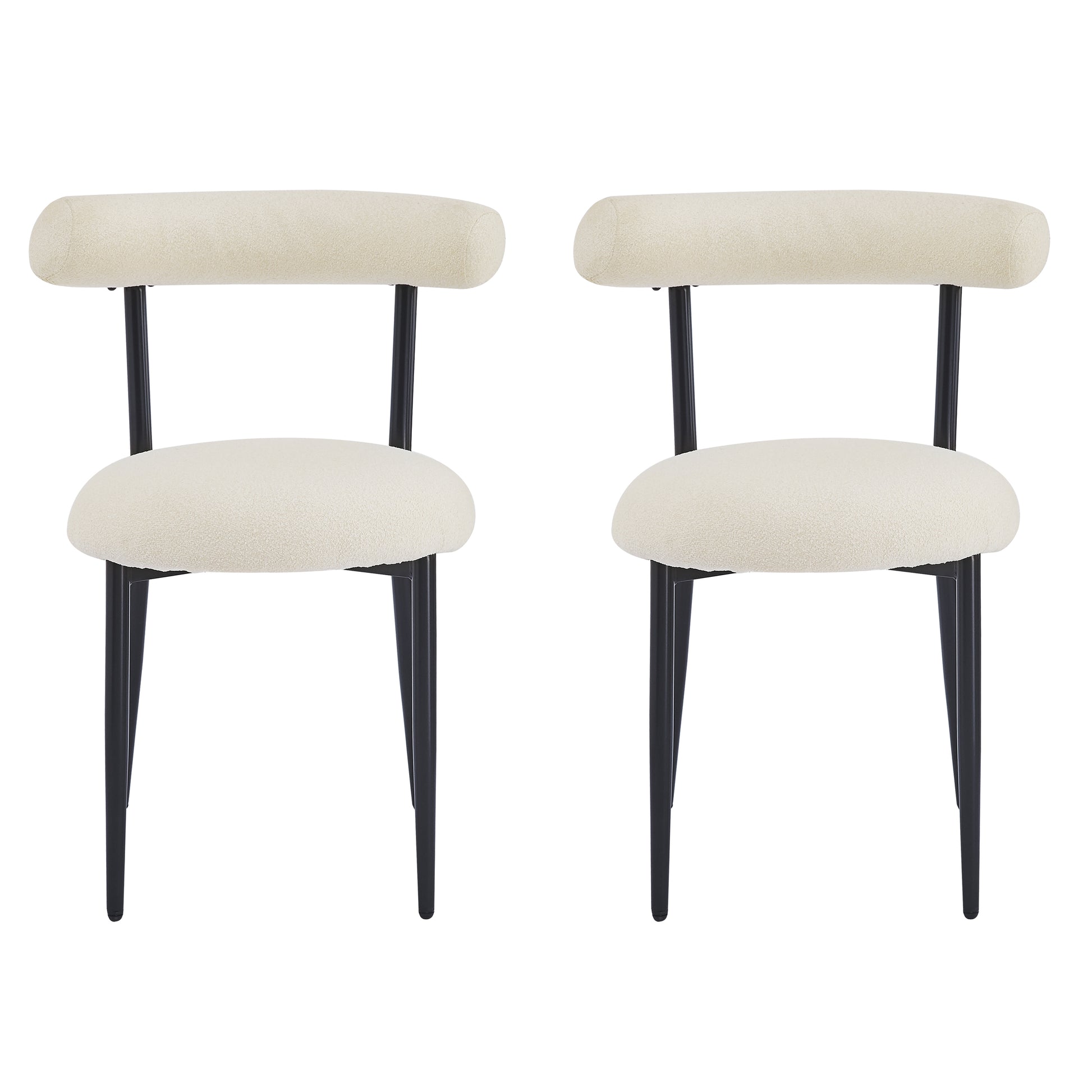 Two cream boucle dining chairs with black metal legs