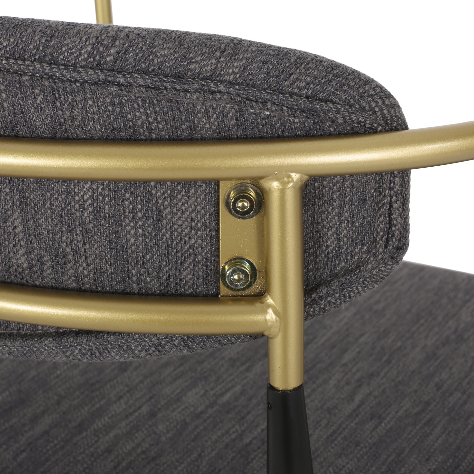 Gray upholstered chair with gold metal frame detail
