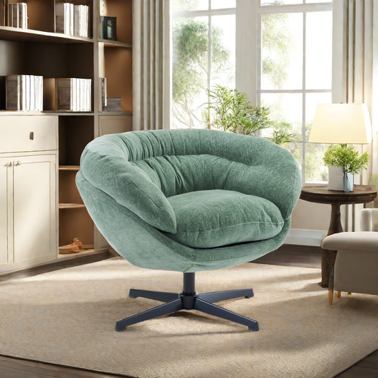 Plush sage green accent chair with swivel base