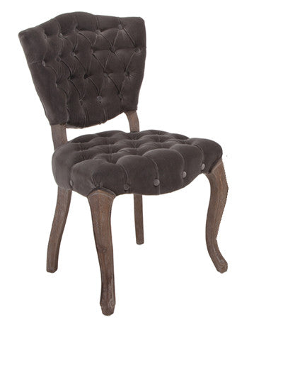 Tufted charcoal grey velvet armchair with carved wood legs