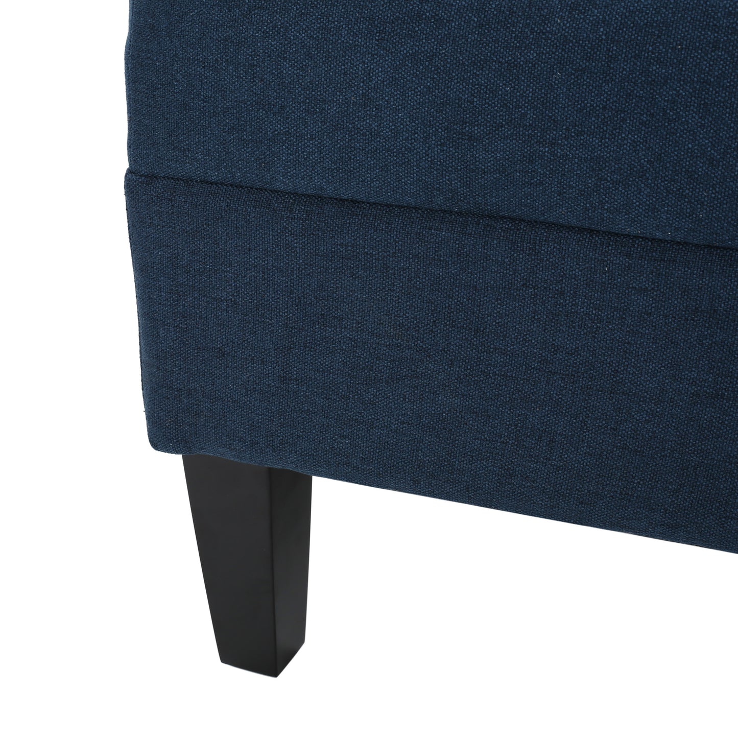 Navy blue fabric sofa with black wooden legs