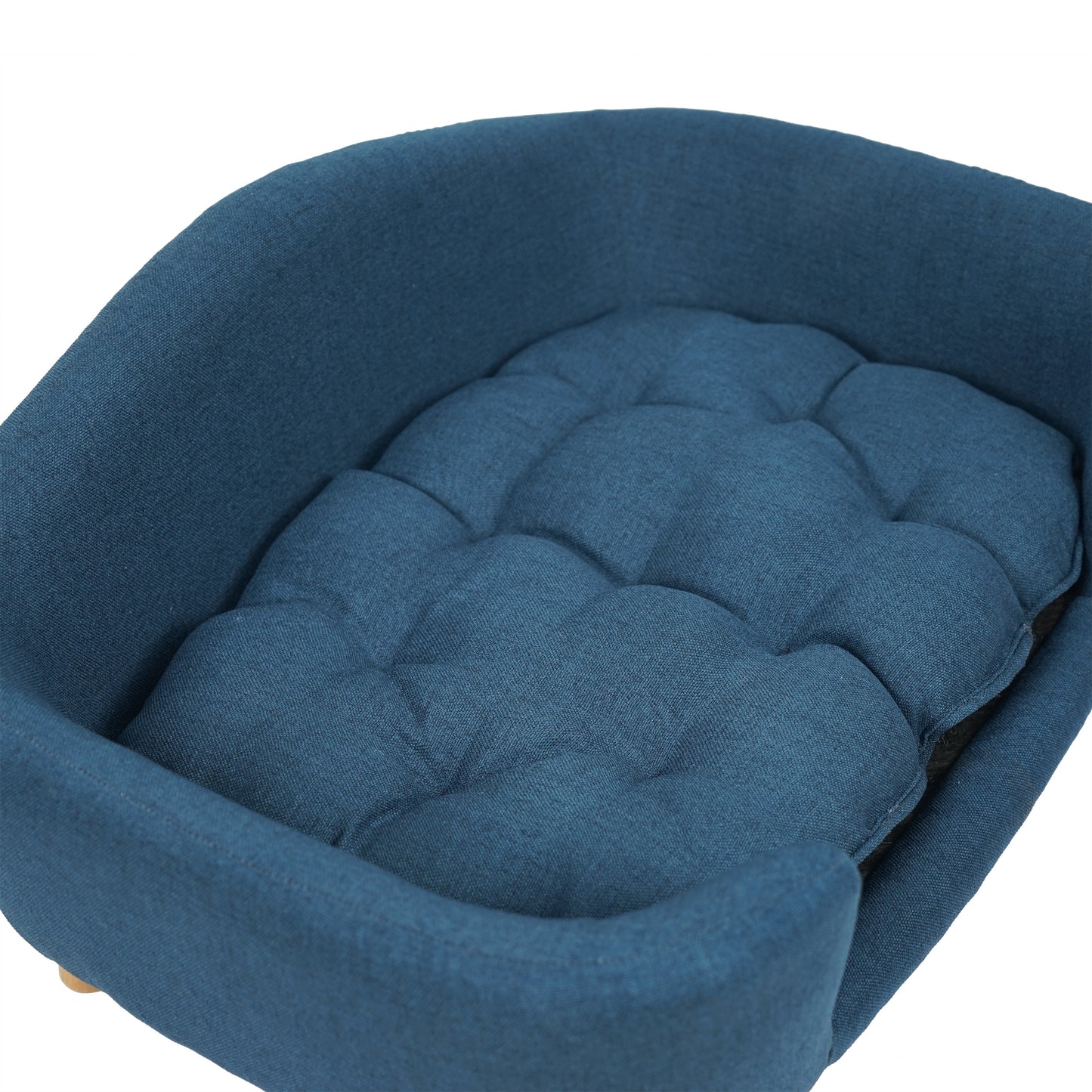 Comfortable tufted blue fabric dog bed with raised sides for support
