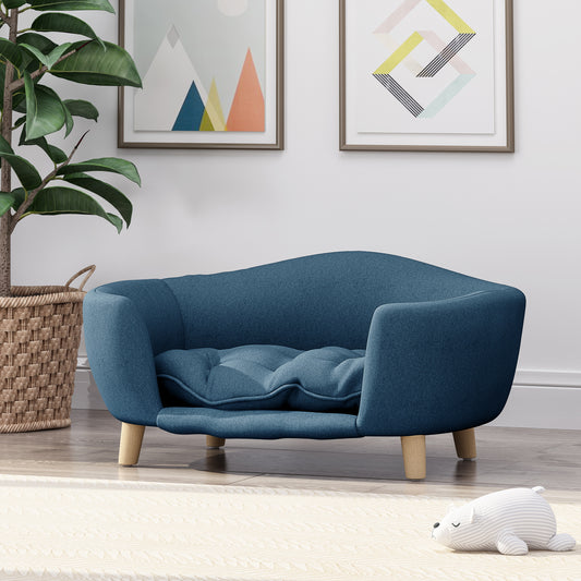 Blue upholstered pet sofa with tufted cushion and wooden legs