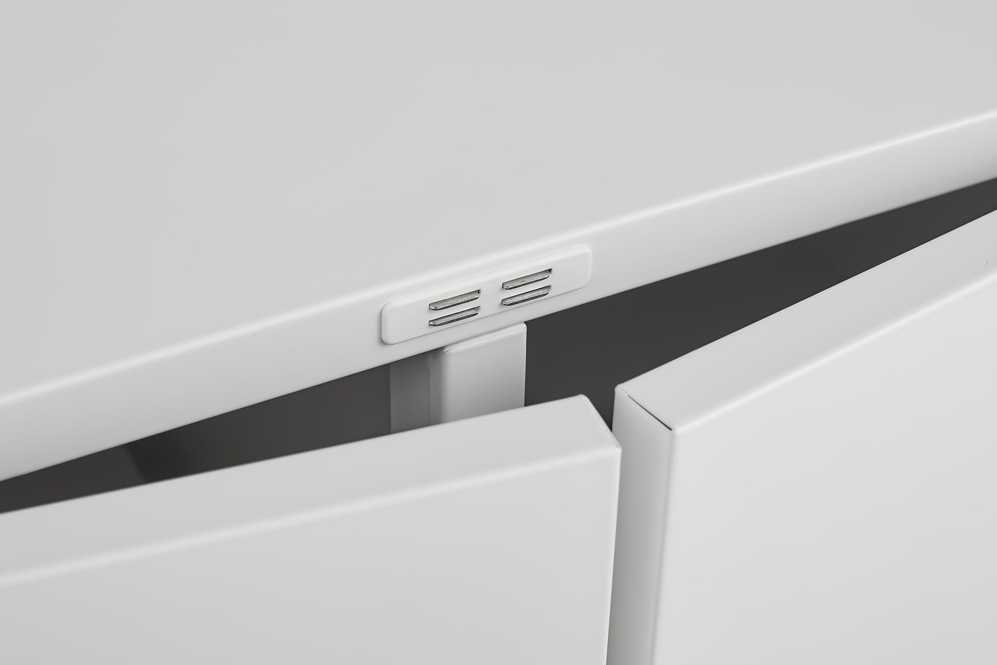 White cabinet push latch mechanism