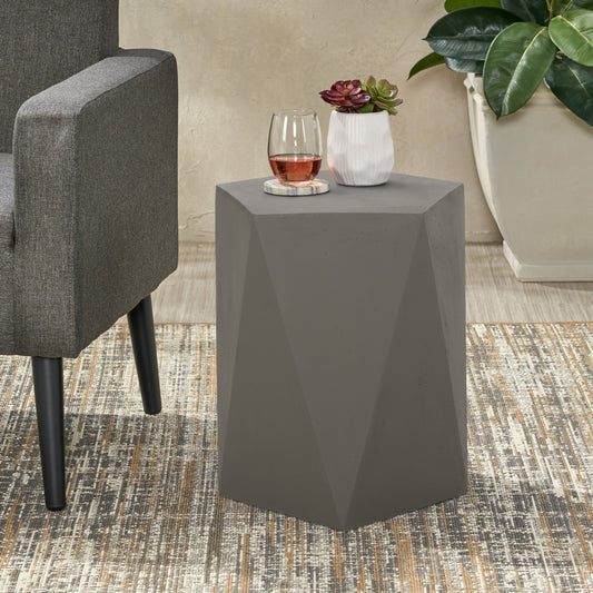 Geometric gray concrete side table with modern faceted design