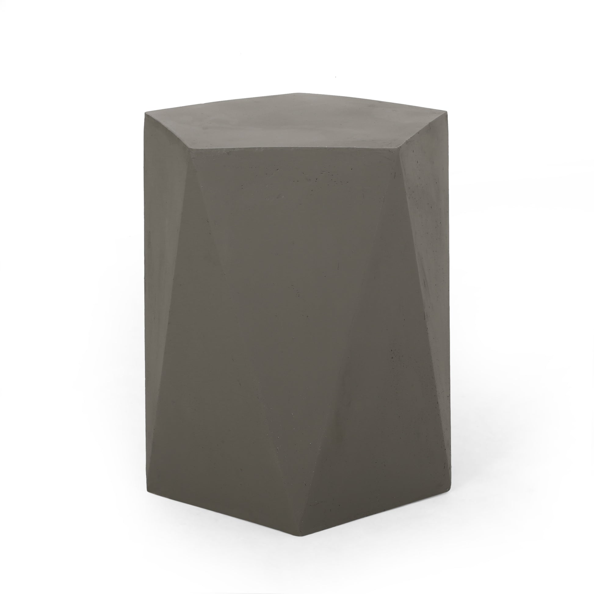 Geometric concrete stool with a faceted dark gray finish