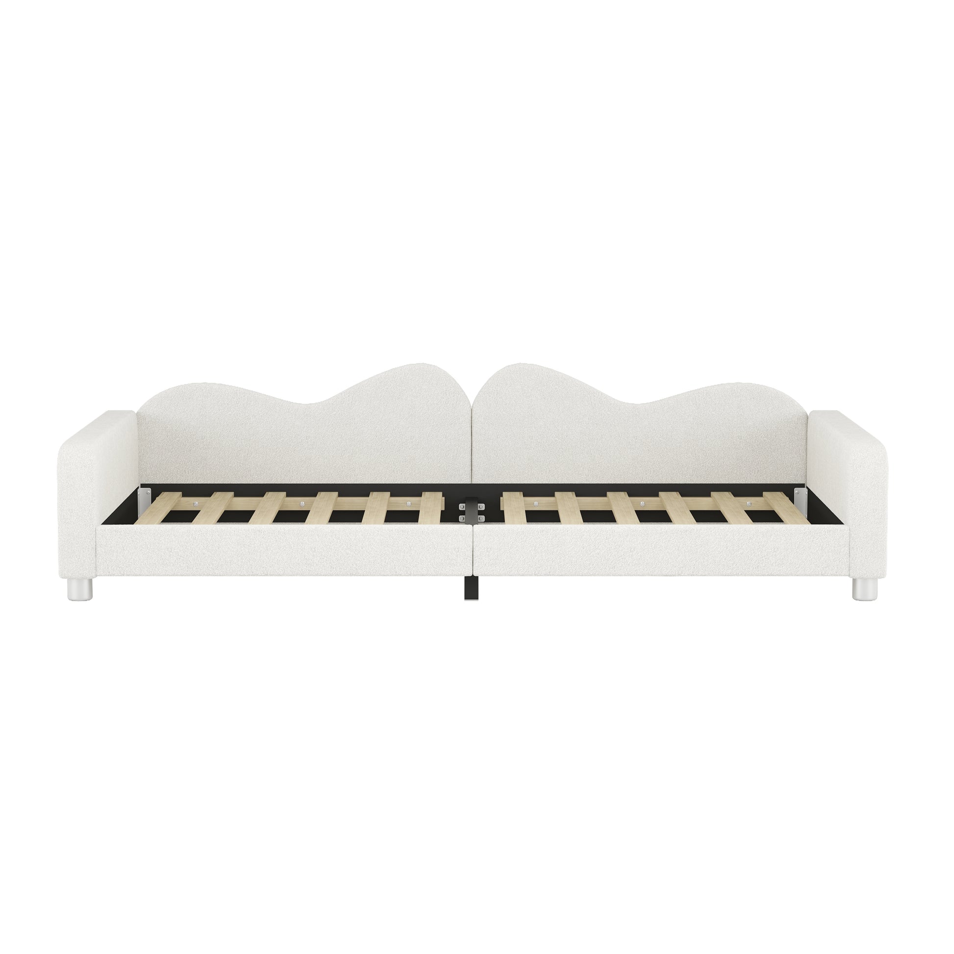 White upholstered daybed with plush fabric and modern wave design