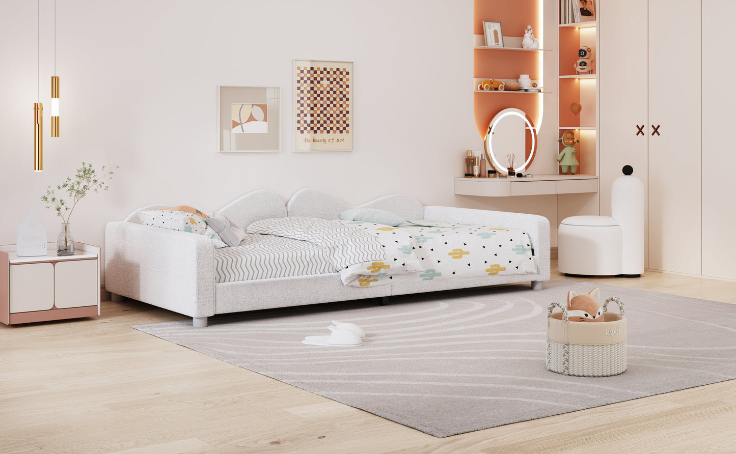 White boucle fabric daybed with playful cactus and chevron bedding