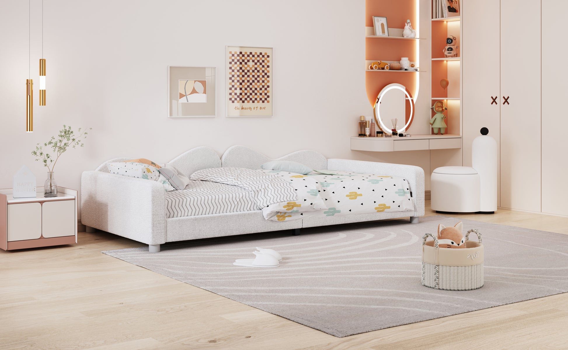 White boucle fabric daybed with playful cactus and chevron bedding