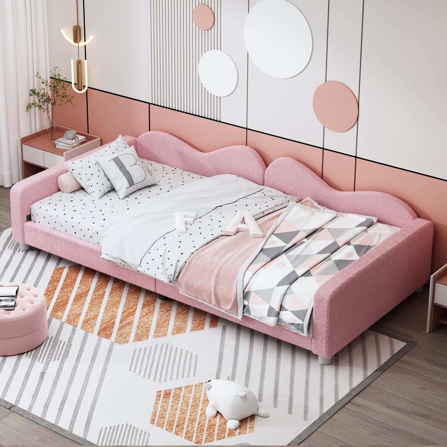Pink fuzzy twin bed with waveshaped headboard and fun bedding
