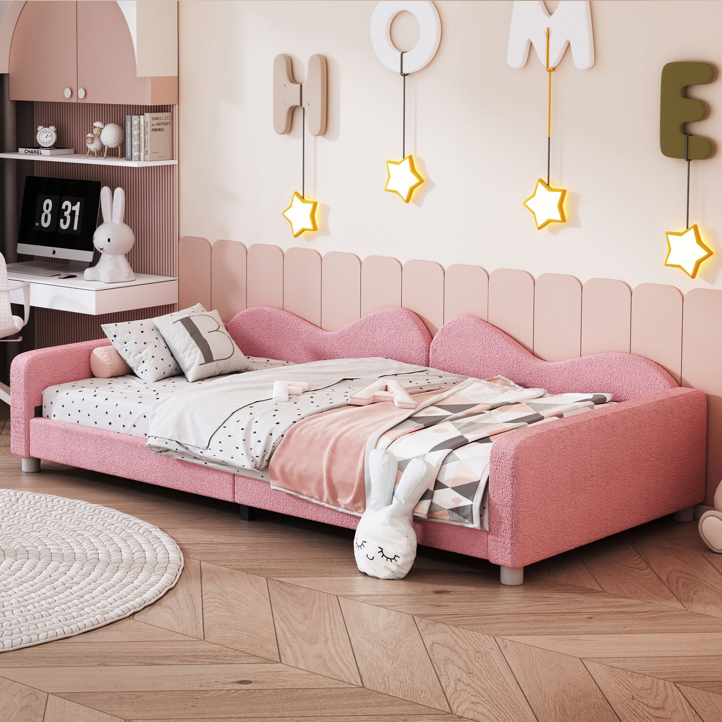 Pink boucle upholstered bed with playful wavy headboard and matching throw pillows